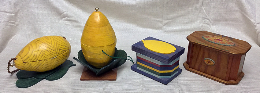 photo of four esrog boxes